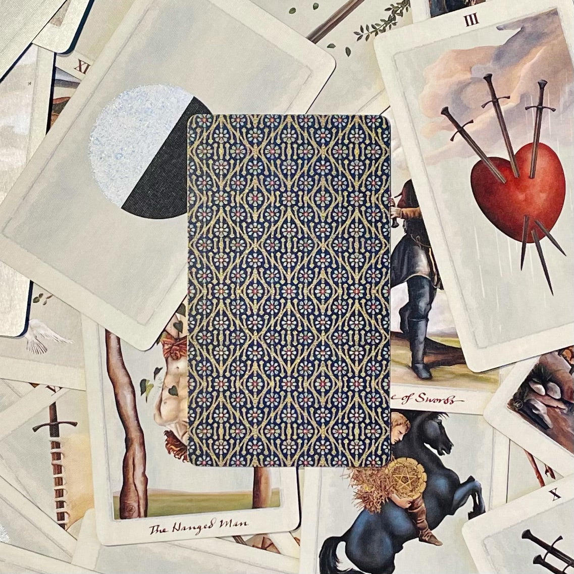 Cover art if the Pagan Otherworlds tarot deck with collection of cards.