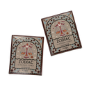 Two boxes of Libra Zodiac Jasmine incense cones shown on a plain white background, one upright and one angled on top. The packaging features a beige background with a brown border, a central illustration of a scale of justice, and decorative geometric patterns.