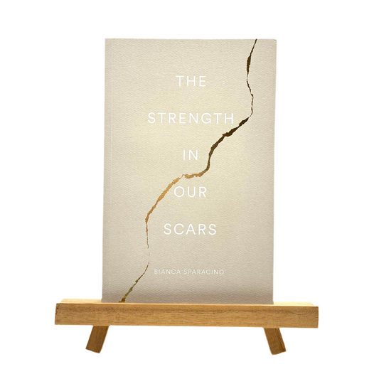 The Strength In Our Scars - book