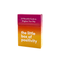 The little box of positivity card deck packaging, featuring a vibrant magenta-to-yellow gradient with white text on a clean white background.