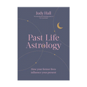 Book cover of 'Past Life Astrology' by Judy Hall, featuring a slate blue-gray background with pink typography, thin orbit lines, and a small gold crescent moon.