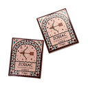 Two square boxes of Sagittarius Zodiac Amber Incense Cones arranged diagonally on a plain white background.