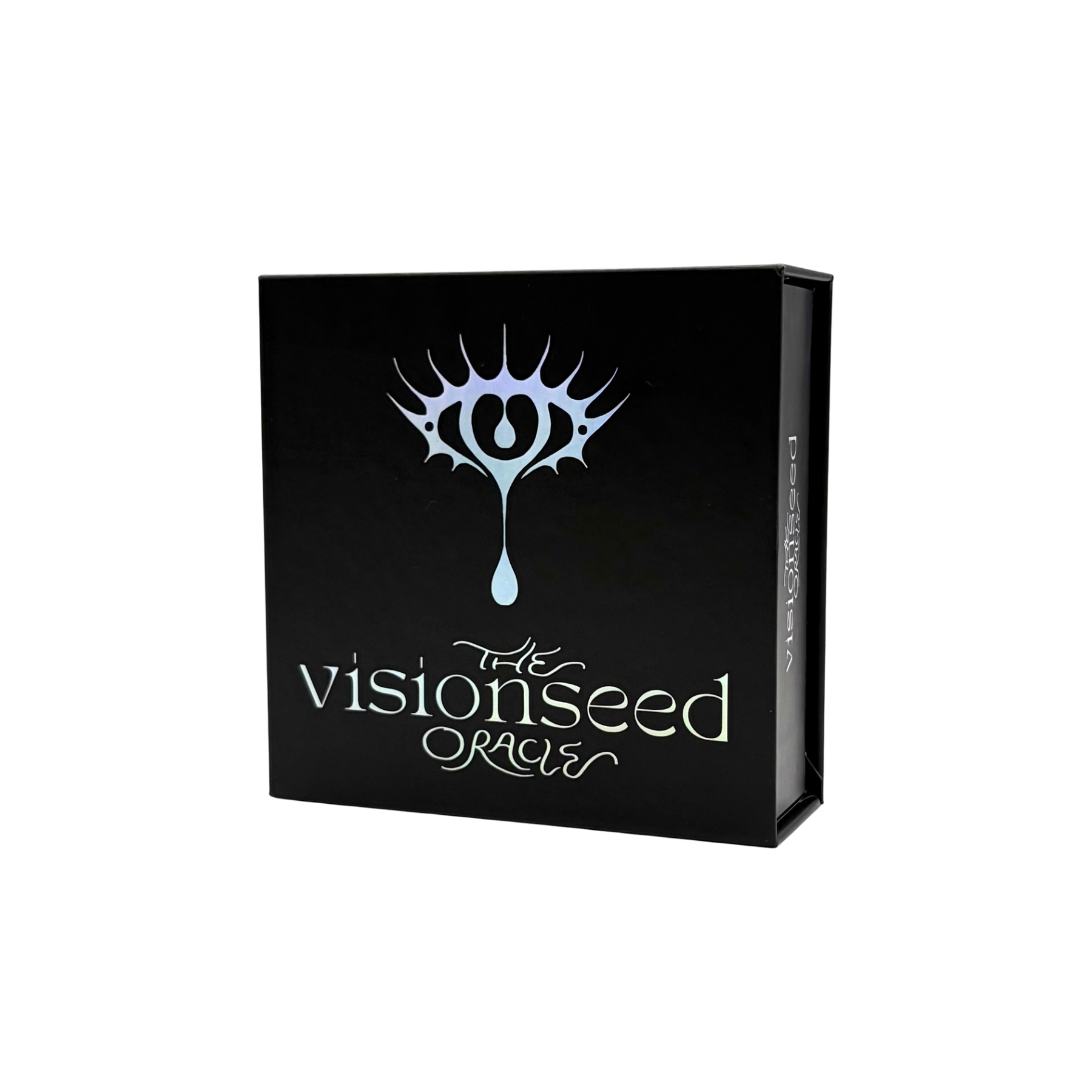 The Visionseed Oracle card deck box, a black rectangular package featuring a stylized silver eye logo and the text 'the visionseed ORACLE' on the front, shown on a plain white background.
