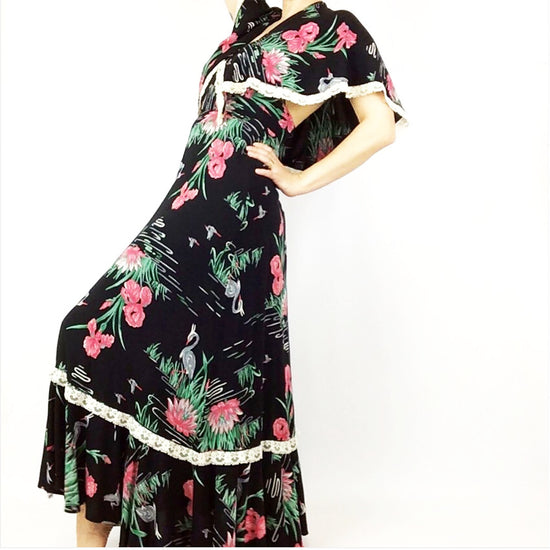 Woman wearing vintage floral print dress.