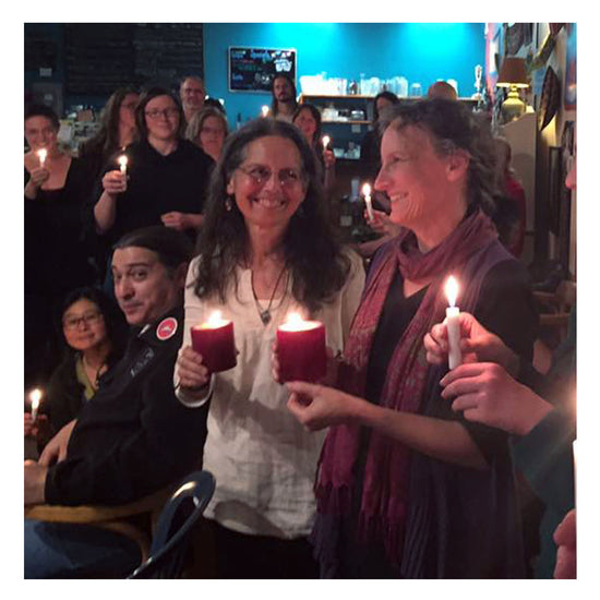 Image of Rosie Finn and Carol Trasatto smiling amongst a crowd.