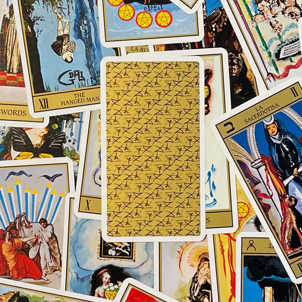 Cover and card artwork from the Dali Tarot deck.