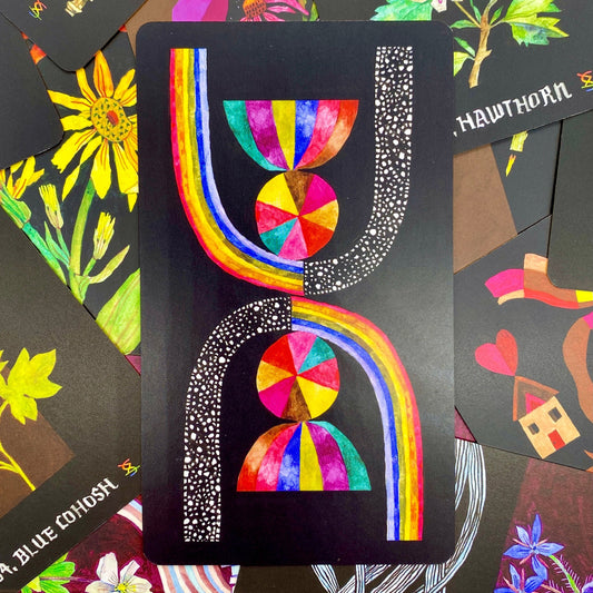 Dirt Gems cards--bright colors on black backgrounds depicting flora.