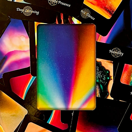 Cover art of the Illuminated Love Oracle deck with collection of cards.