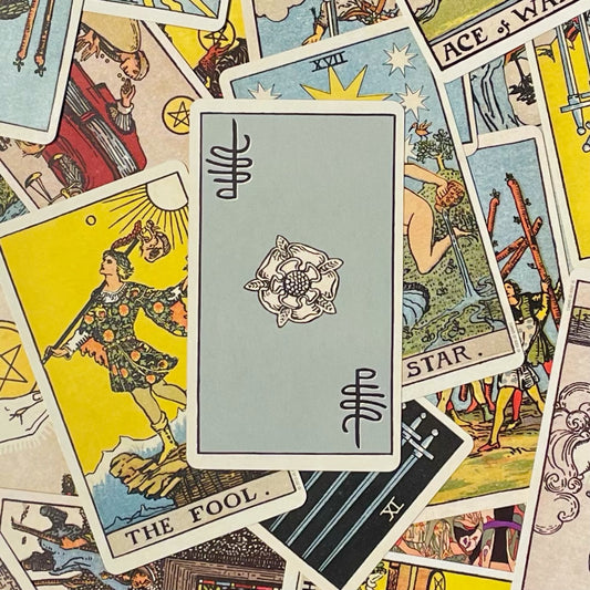 Cover art of the Smith Waite Centennial Tarot deck with collection of cards.