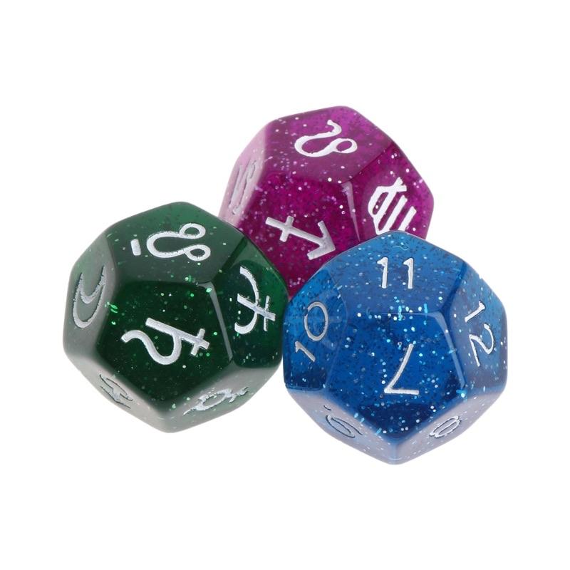 Three astro dice displayed in various colors.