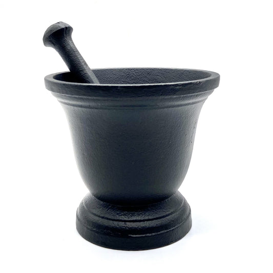 Black cast iron mortar and pestle ritual bowl.