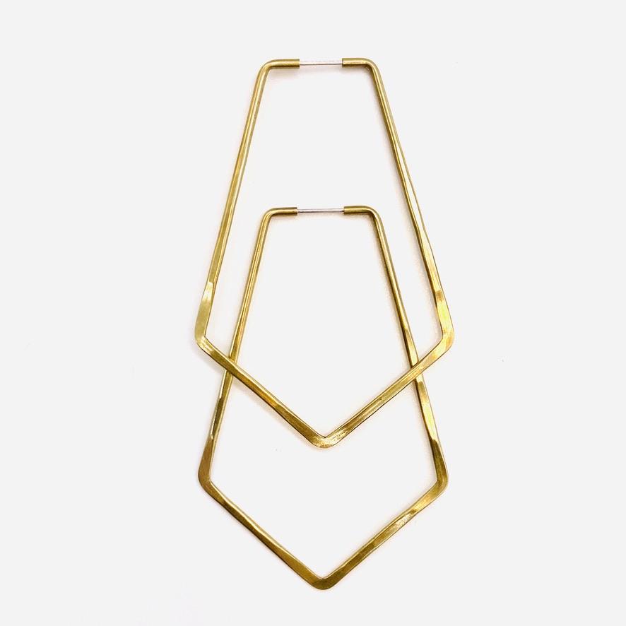 Brass geometric hoop earrings in lita shape.