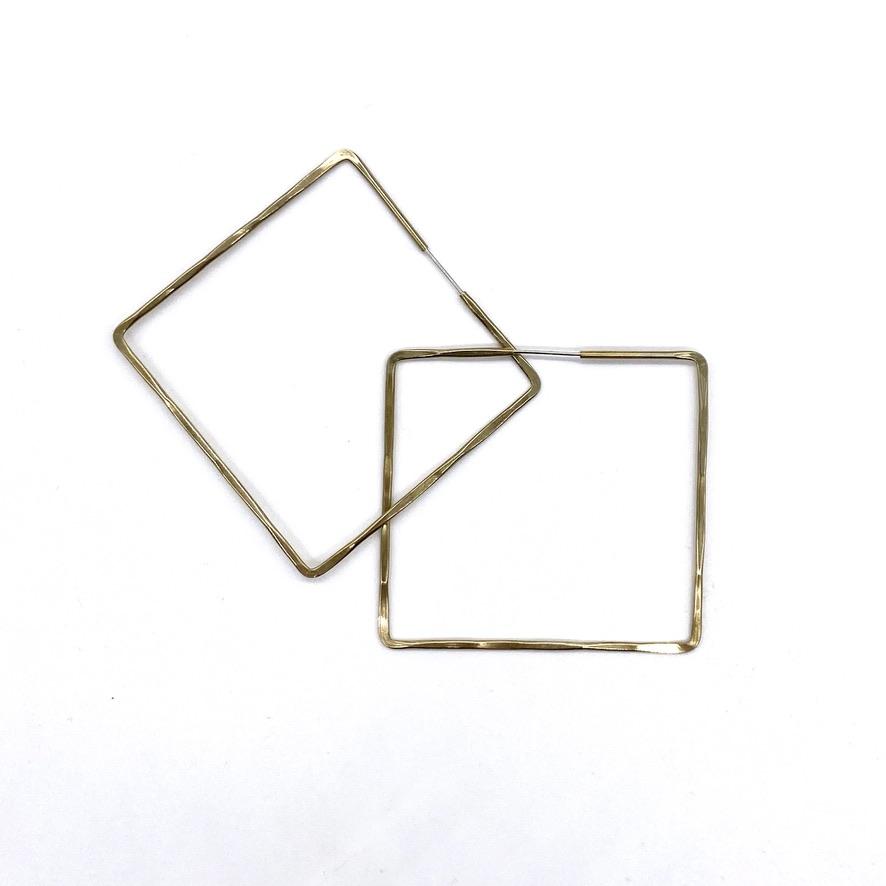 Brass geometric hoop earrings in square shape.