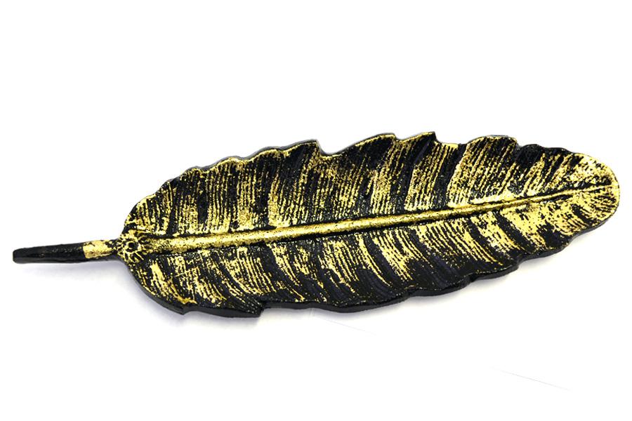 Golden leaf shaped incense burner.