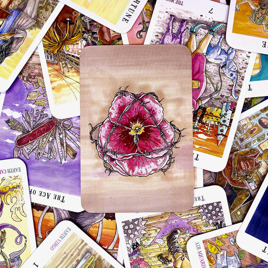 Next World Tarot card artwork with collection of various cards.