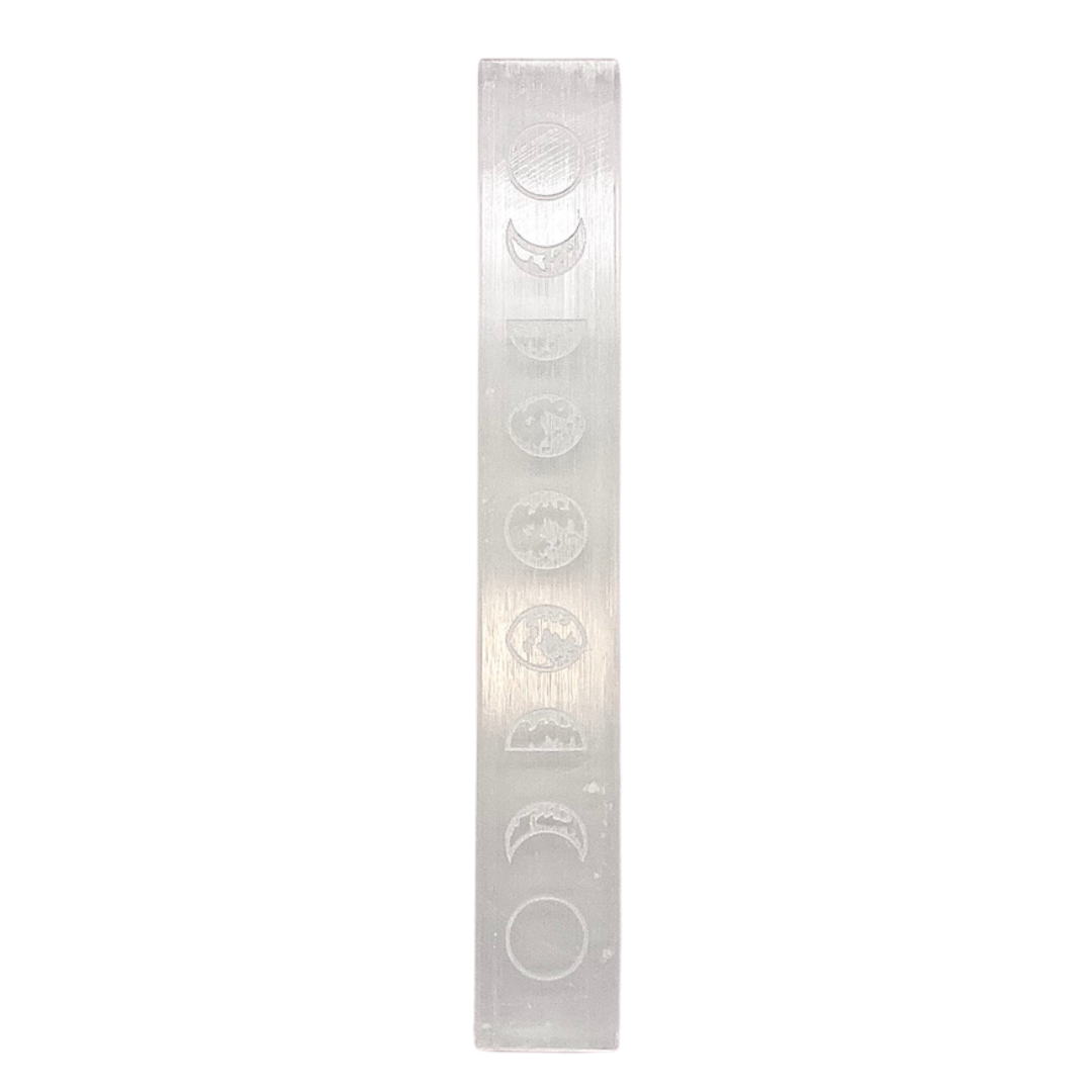 Selenite crystal bar with moon phases etching.