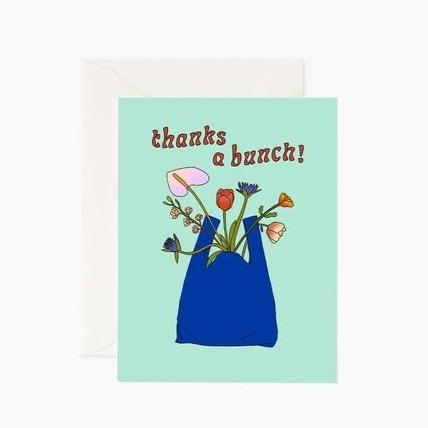 Greeting card with text "thanks a bunch" with floral artwork.